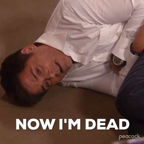 Rob Lowe lying on the ground, sad, saying "Now I'm Dead". 
